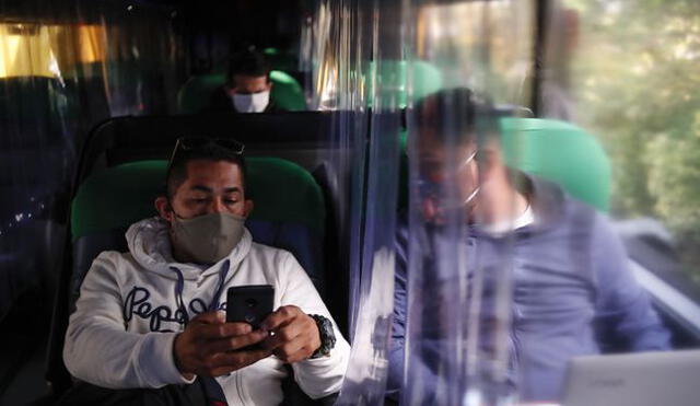 Pasajeros de buses interprovinciales viajarán usando mascarilla. Foto: Andina.