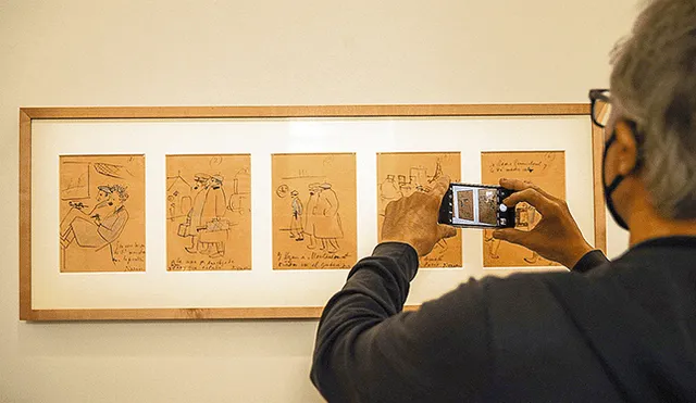 Gráfico. Un visitante del Museo Picasso de París intenta capturar a los personajes de Pablo Picasso en su faceta de dibujante. (Foto: EFE)