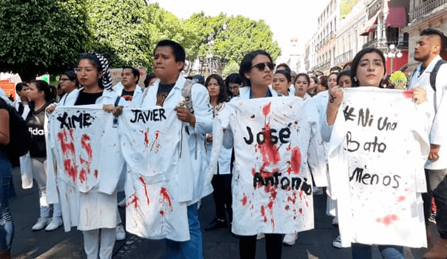 Conductores de Uber se unen a marcha por estudiantes asesinados de Puebla [VIDEO]