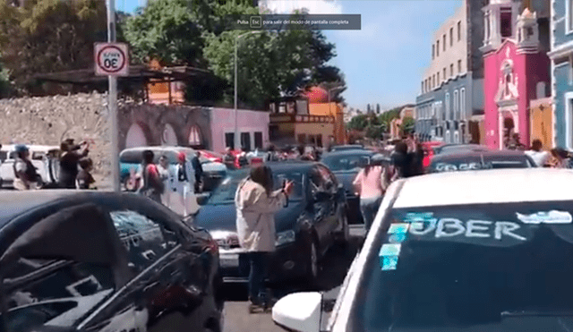 Choferes de Uber se unen a protestas por estudiantes asesinados en Puebla