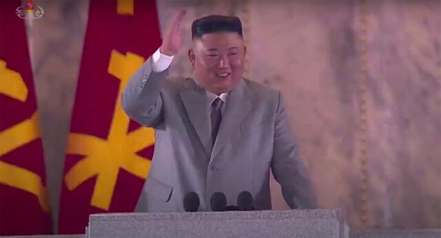 A screen grab taken from a KCNA broadcast on October 10, 2020 shows North Korean leader Kim Jong Un waving during a military parade marking the 75th anniversary of the founding of the Workers' Party of Korea, on Kim Il Sung square in Pyongyang. - Nuclear-armed North Korea held a giant military parade, television images showed, with thousands of maskless troops defying the coronavirus threat and Pyongyang expected to put on show its latest and most advanced weapons. (Photo by - / KCNA VIA KNS / AFP) / - South Korea OUT / REPUBLIC OF KOREA OUT   ---EDITORS NOTE--- RESTRICTED TO EDITORIAL USE - MANDATORY CREDIT "AFP PHOTO/KCNA" - NO MARKETING NO ADVERTISING CAMPAIGNS - DISTRIBUTED AS A SERVICE TO CLIENTS
THIS PICTURE WAS MADE AVAILABLE BY A THIRD PARTY. AFP CAN NOT INDEPENDENTLY VERIFY THE AUTHENTICITY, LOCATION, DATE AND CONTENT OF THIS IMAGE. / 