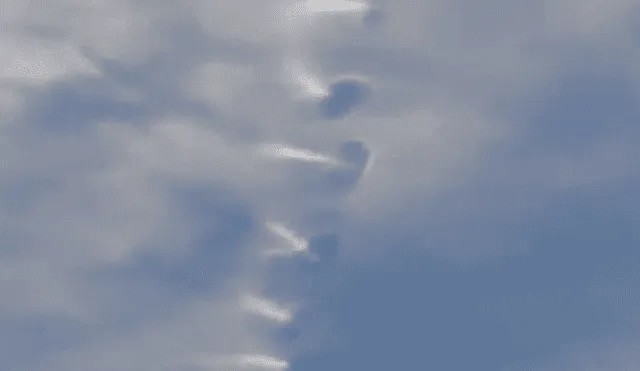 Video es viral en YouTube.  Un hombre grabó el preciso momento en que varias nubes se alinearon, como si fueran una escalera hacia el cielo. Foto: Captura.