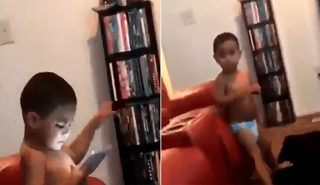 Facebook: niño mira su celular, algo que ve le molesta y tiene esta increíble reacción [VIDEO]