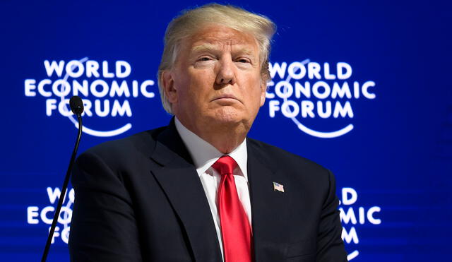 US President Donald Trump looks on during a discussion after delivering his speech during the World Economic Forum (WEF) annual meeting on January 26, 2018 in Davos, eastern Switzerland. (Photo by Fabrice COFFRINI / AFP)