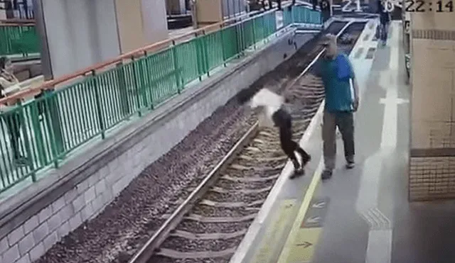 YouTube: tras empujar a mujer a vías del tren, hombre se retira como si no hubiese pasado nada