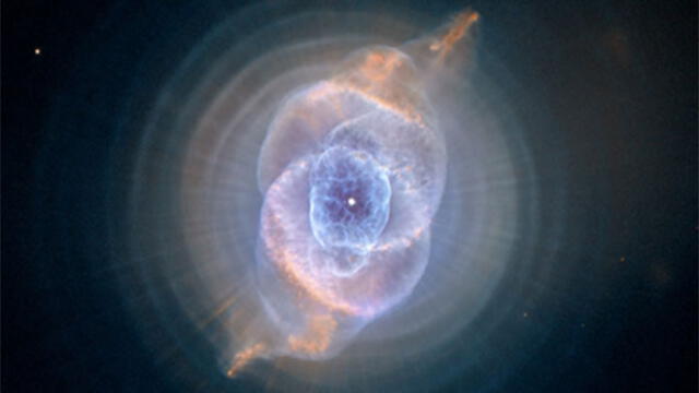 El universo actual pudo surgir a partir de uno anterior. Foto: Nebulosa del Ojo de Gato (los restos de una estrella muerta) captada por el Telescopio Hubble. NASA / ESA.