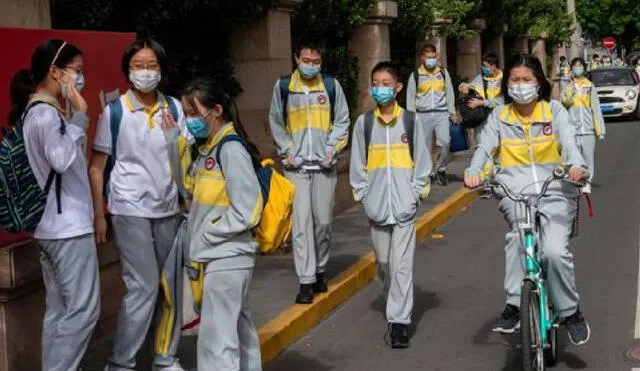 Los colegios permacieron cerrados desde enero, sin embargo, desde este lunes han vuelto a abrir sus puertas. Foto: AFP