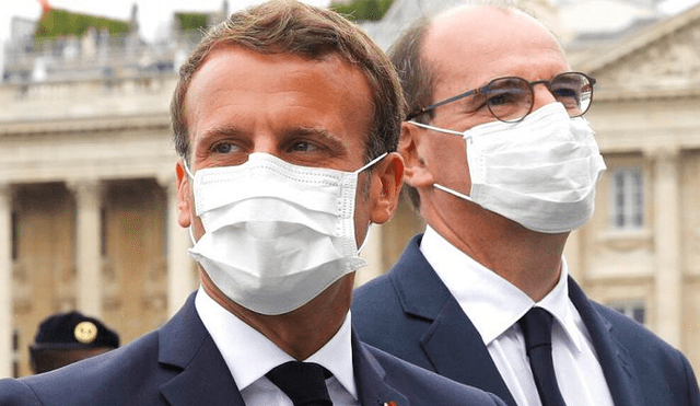Emmanuel Macron y el primer ministro Jean Castex predican con el ejemplo. (Foto: The Associated Press)