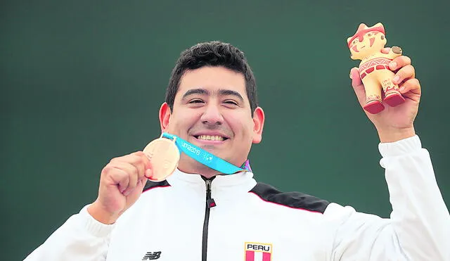 Lima, Thursday August 01, 2019  - Marko Carrillo from Peru shows his bronze medal in the men´s 25m gun category at Base Las Palmas during the Pan American Games Lima 2019.

Copyright Juan Carlos Guzman / Lima 2019

Mandatory credits: Lima 2019
** NO SALES ** NO ARCHIVES **