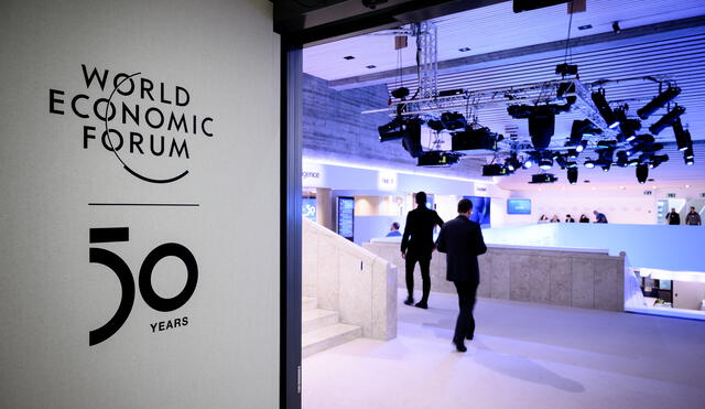 A sign of the World Economic Forum (WEF) is seen at the Congress center ahead of the WEF's annual meeting in Davos, on January 19, 2020. (Photo by Fabrice COFFRINI / AFP)
