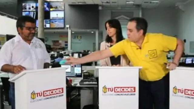 Mario Bryce y Julio Arbizu en debate electoral.