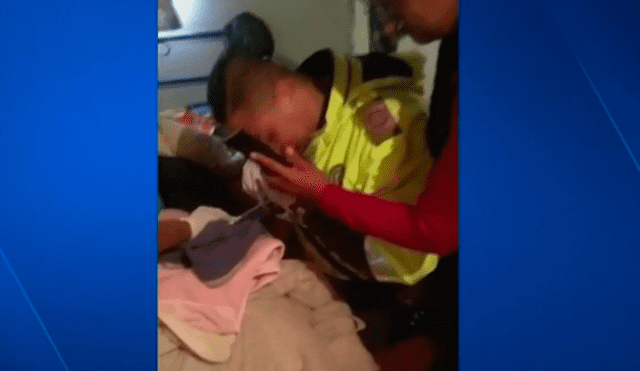 Policía salva a recién nacido siguiendo instrucciones por teléfono [VIDEO]