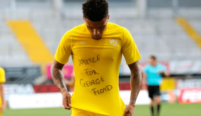 Jadon Sancho exige justicia por el asesinato de estadounidense George Floyd tras anotar con el Borussia Dortmund. (FOTO: AFP).