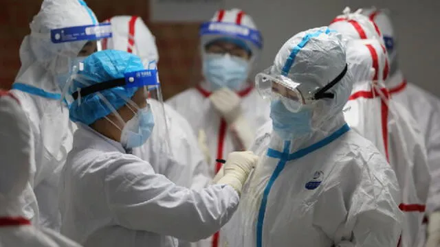 El número de infectados por día en China ha disminuido a menos de 15. Foto: AFP.