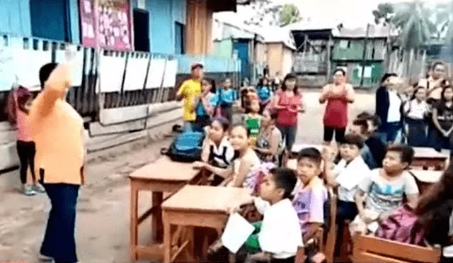 Alumnos de colegio público en Amazonas estudian en plena calle. Foto: Captura de video
