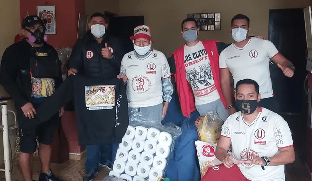 Grupo de hinchas apoyan a persona vulnerable de coronavirus. | Foto: Twitter de Barra Oriente