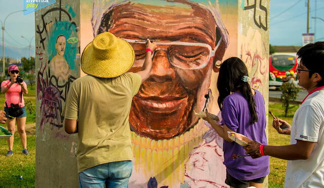 Artistas urbanos realizan murales en los postes de la Línea 1 del metro de Lima