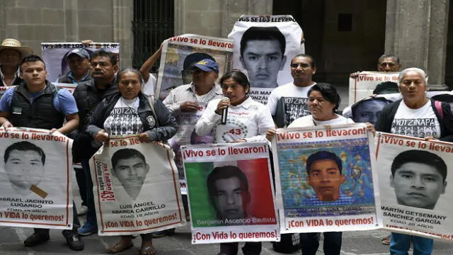 Relatives of the 43 missing students of the Ayotzinapa Rural Teachers' College speak during a press conference at Palacio Nacional, after a meeting with Mexican President Andres Manuel Lopez Obrador, in Mexico City, on March 5, 2020. (Photo by ALFREDO ESTRELLA / AFP)