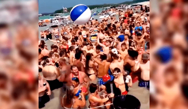 Cientos de personas abarrotaron el lago Diamond en Michigan sin mantener la distancia ni el uso de mascarillas. (Foto: MLive)