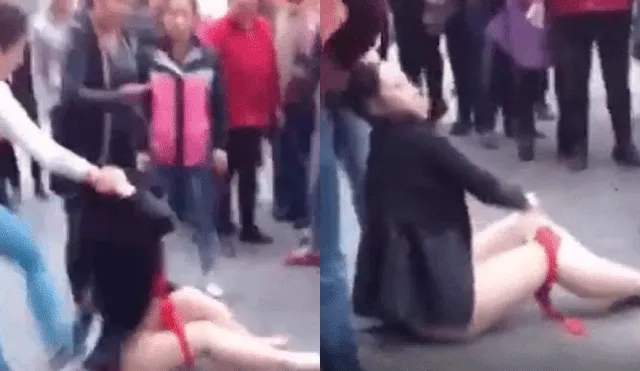 En YouTube, furiosa mujer golpea y desviste a la amante de su esposo en medio de la calle [VIDEO]