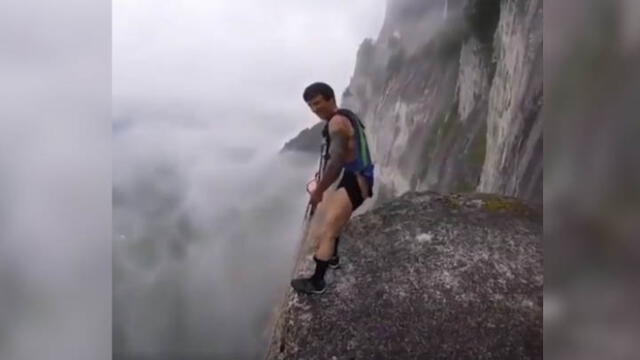 Facebook: Reto de locura, joven se lanza en parapente desde acantilado [VIDEO]