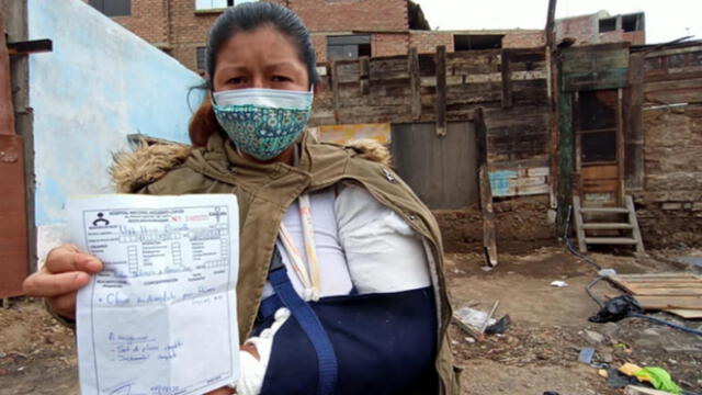 Mujer y sus hijos pueden comer gracias a la ayuda de sus vecinos. (Foto: Joel Robles / URPI - GLR)