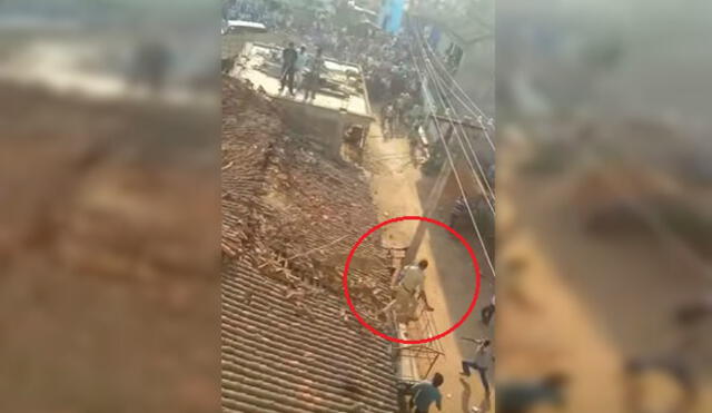 YouTube: hombre salta de un tejado para evitar ser atacado por un leopardo 