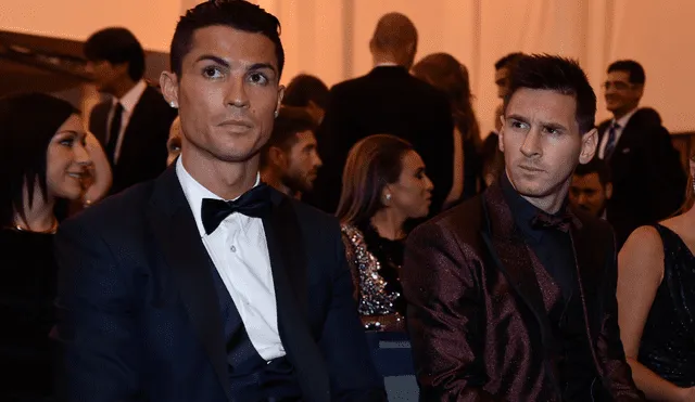 Lionel Messi y Cristiano Ronaldo en una gala del Balón de Oro. | Foto: AFP