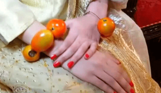 Novia prefiere utilizar tomates en lugar de joyas durante su boda [VIDEO]