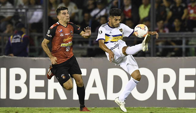 Boca Juniors empató con Caracas FC en Venezuela por la Copa Libertadores 2020 y Carlos Zambrano debutó con la camiseta 'Xeneize'. Foto: AFP
