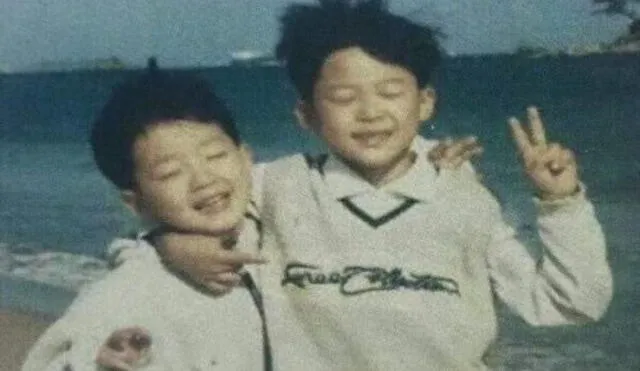 Foto de la infancia de Jimin de BTS junto a su menor hermano.