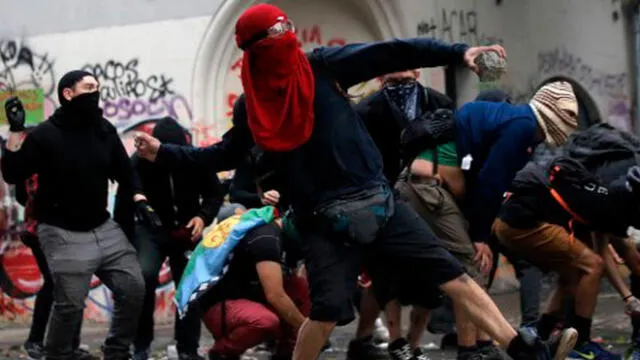 Ciudadanos protestan contra Sebastián Piñera. Foto: AFP.