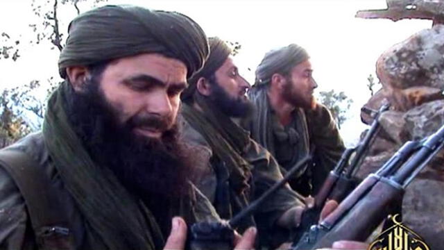 (FILES) In this undated handout file photo released by Al-Andalus on May 23, 2012 shows Abdelmalek Droukdel, aka Abu Musab Abdul Wadud, a leader of Al-Qaeda in the Islamic Maghreb (AQIM), with his fighters in Azawad, an unrecognized state in northern Mali. - Al-Qaeda in the Islamic Maghreb (AQIM) chief Abdelmalek Droukdel was killed on June 5, 2020 in Mali. (Photo by - / Al-Andalus / AFP) / RESTRICTED TO EDITORIAL USE - MANDATORY CREDIT "AFP PHOTO/ AL-ANDALUS" - NO MARKETING - NO ADVERTISING CAMPAIGNS - DISTRIBUTED AS A SERVICE TO CLIENTS