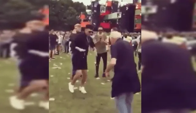 YouTube: Abuelo reta a bailar a joven en concierto de música electrónica [VIDEO]