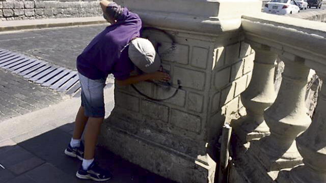 Estudiantes buscan inculcar en población reparar paredes con grafitis
