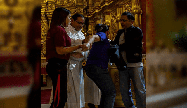 Twitter: Chavista intentó agredir a sacerdote por estar en contra de Maduro [VIDEO]