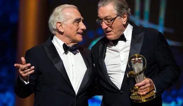 US actor Robert de Niro (R) poses with a Tribute award, next to US Director Martin Scorsese during the 17th Marrakech International Film Festival on December 1, 2018. (Photo by FADEL SENNA / AFP)