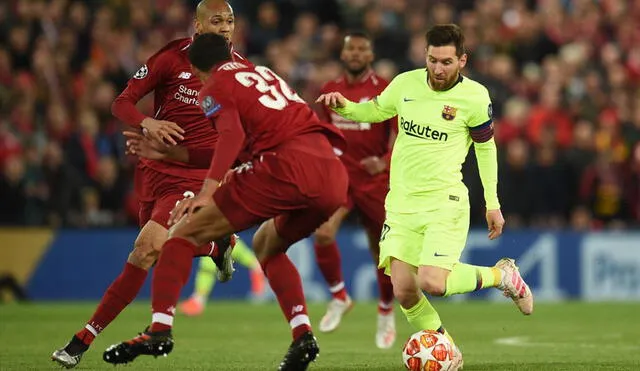 Joel Matip va a la marca de Lionel Messi en el partido Liverpool vs. Barcelona por las semifinales de la Champions League 2018/2019. Foto: AFP.