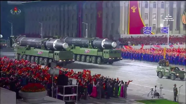 A screen grab taken from a KCNA broadcast on October 10, 2020 shows what appears to be new North Korean intercontinental ballistic missiles during a military parade marking the 75th anniversary of the founding of the Workers' Party of Korea, on Kim Il Sung square in Pyongyang. - Nuclear-armed North Korea held a giant military parade, television images showed, with thousands of maskless troops defying the coronavirus threat and Pyongyang expected to put on show its latest and most advanced weapons. (Photo by - / KCNA / AFP) / - South Korea OUT / REPUBLIC OF KOREA OUT   ---EDITORS NOTE--- RESTRICTED TO EDITORIAL USE - MANDATORY CREDIT "AFP PHOTO/KCNA" - NO MARKETING NO ADVERTISING CAMPAIGNS - DISTRIBUTED AS A SERVICE TO CLIENTS
THIS PICTURE WAS MADE AVAILABLE BY A THIRD PARTY. AFP CAN NOT INDEPENDENTLY VERIFY THE AUTHENTICITY, LOCATION, DATE AND CONTENT OF THIS IMAGE. / The erroneous mention appearing in the metadata of this photo by - has been modified in AFP systems in the following manner: [what appears to be new North Korean intercontinental ballistic missiles ] instead of [North Korean Hwasong-12 intercontinental ballistic missiles]. Please immediately remove the erroneous mention from all your online services and delete it from your servers. If you have been authorized by AFP to distribute it to third parties, please ensure that the same actions are carried out by them. Failure to promptly comply with these instructions will entail liability on your part for any continued or post notification usage. Therefore we thank you very much for all your attention and prompt action. We are sorry for the inconvenience this notification may cause and remain at your disposal for any further information you may require.