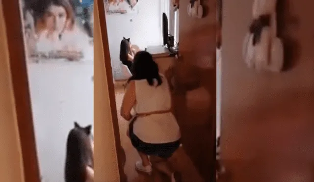 Video es viral en YouTube. La mujer quiso ayudar a su hija durante una exposición y se tuvo que arrastrar por el piso para evitar que el profesor y los alumnos la vieran.