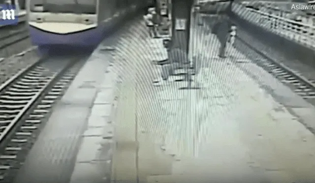 YouTube: preciso instante en que hombre cae a las vías del tren [VIDEO]