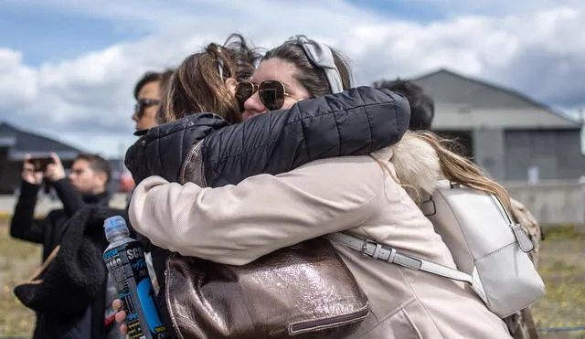 Restos de víctimas de avión chileno llegan a base militar en Punta Arenas. Foto: AFP.
