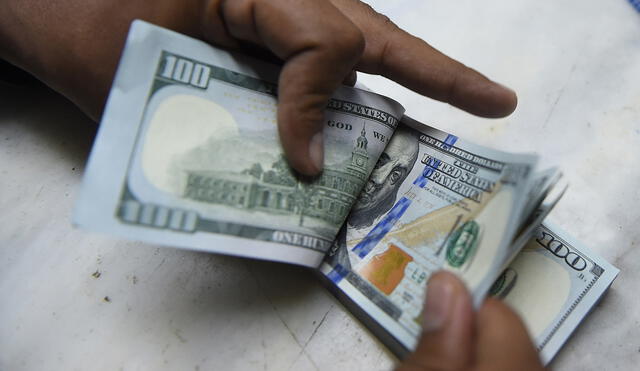 La divisa presentó una variación del -0,19% con respecto a la cotización del cierre del 24 de diciembre. Foto: AFP