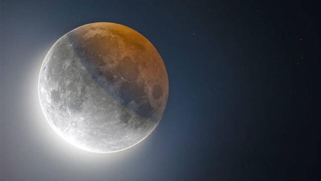 Parte de la luna es opacada por la sombra de la Tierra durante un eclipse lunar. Crédito: Cristian Fattinnanzi.