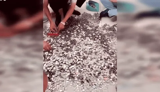YouTube viral: Hombre compra lujoso auto y lo paga con 66 bolsas repletas de monedas [VIDEO]