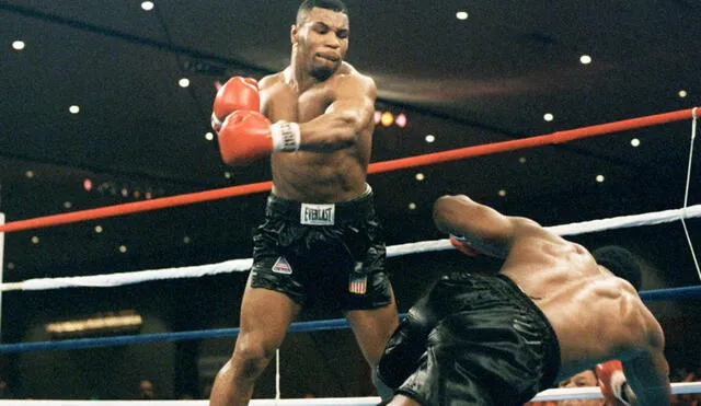 Mike Tyson es el boxeador más joven de la historia en conseguir un título mundial de los pesos pesados. (Foto: AFP)