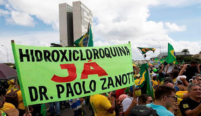 "Hidroxicloroquina ya", se leía en uno de los carteles. Foto: EFE