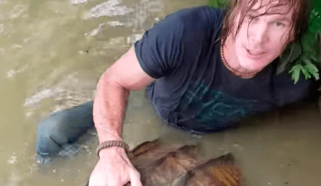 Facebook viral: joven queda impactado al ver extraño reptil que aparece en lago [VIDEO]