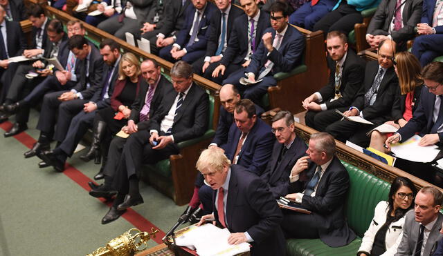 A handout photograph released by the UK Parliament shows Britain's Prime Minister Boris Johnson appearing in the House of Commons in central London on January 22, 2020, during the Prime Minister's Questions (PMQ) session. (Photo by JESSICA TAYLOR / various sources / AFP) / RESTRICTED TO EDITORIAL USE - NO USE FOR ENTERTAINMENT, SATIRICAL, ADVERTISING PURPOSES - MANDATORY CREDIT " AFP PHOTO / Jessica Taylor /UK Parliament"