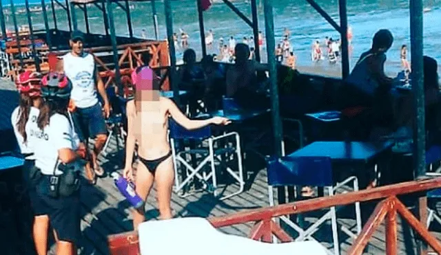 Dos guardias llegaron a pedirle que se coloque el bikini completo, y ante la negativa de la joven, dos guardavidas llegaron a insistir. (Foto: captura)